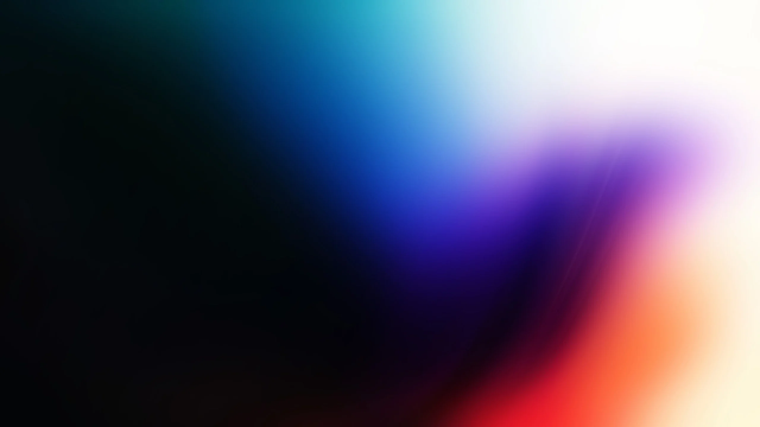 Abstract image with a gradient blend of black, blue, purple, white, and red colors, creating a smooth, colorful transition across the frame.